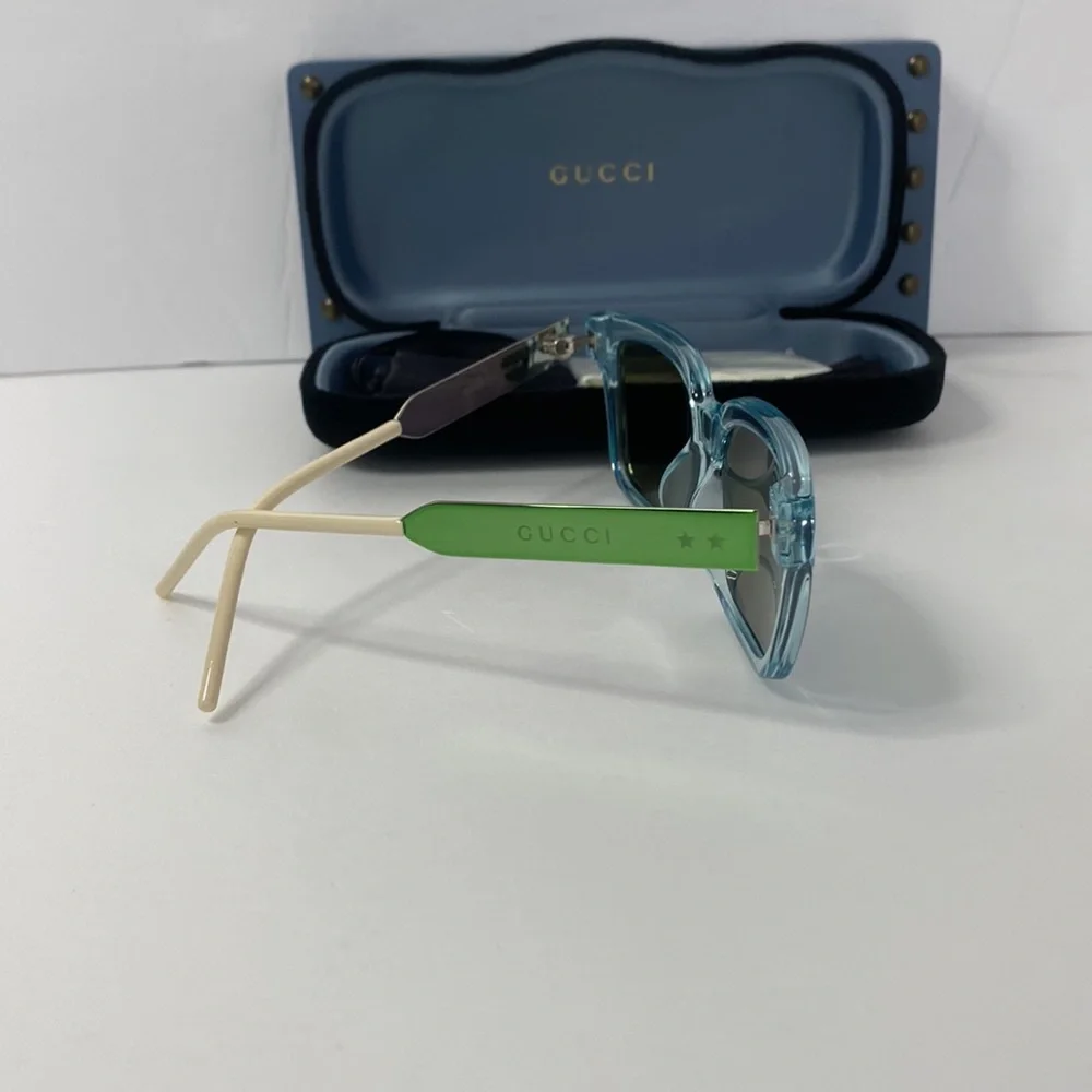 Gucci GG0975S 003 Men’s Translucent Square Sunglasses in Light Blue